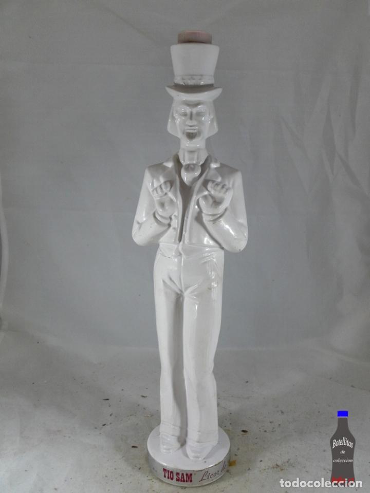 Collection of wines and liquors: BOTELLA TIO SAM LICOR DE COCO DESTILERIAS VIRBEN VILAFRANCA DEL PENEDES BARCELONA