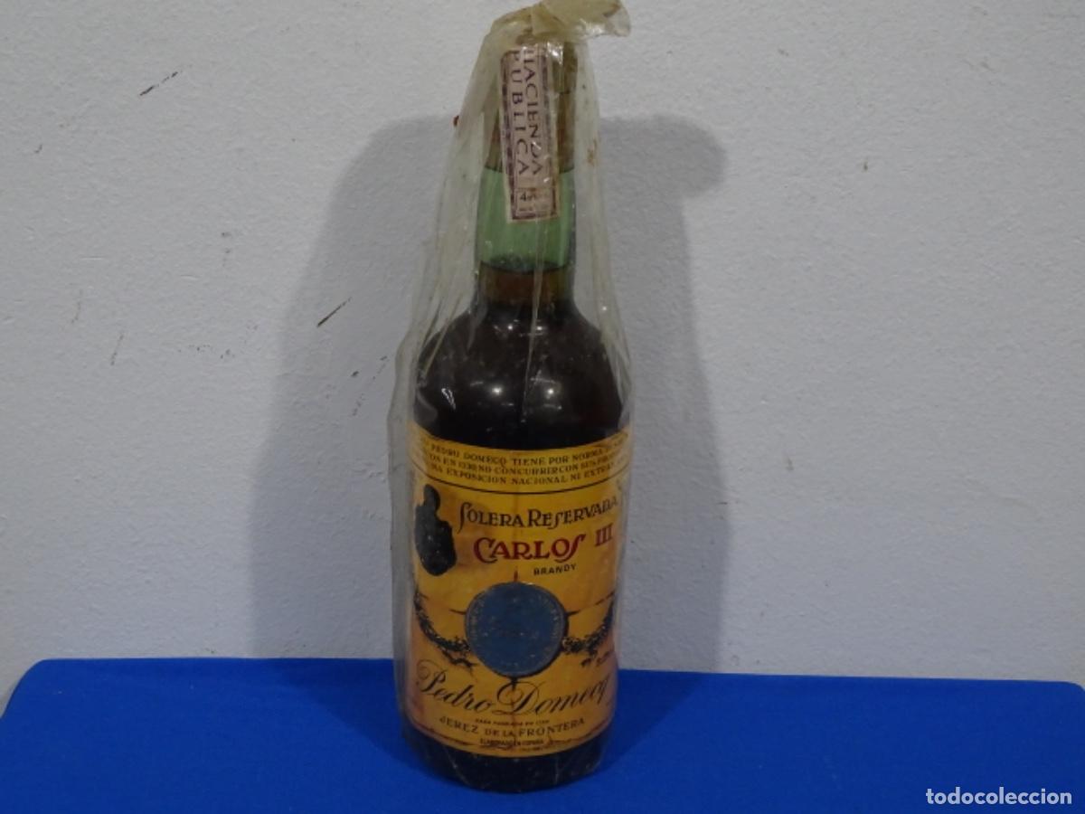 Coleccionismo de vinos y licores: BRANDY CARLOS III SOLERA RESERVADA. PEDRO DOMEQ. 4 PESETAS FRANCO.