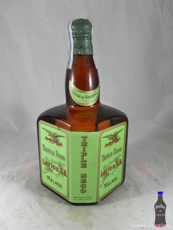 Sammlung von Weinen und Lik&ouml;ren: BOTELLA TRIPLE SECO LICOR DE NARANJA LARIOS S.A. MALAGA 1.6 PESETAS