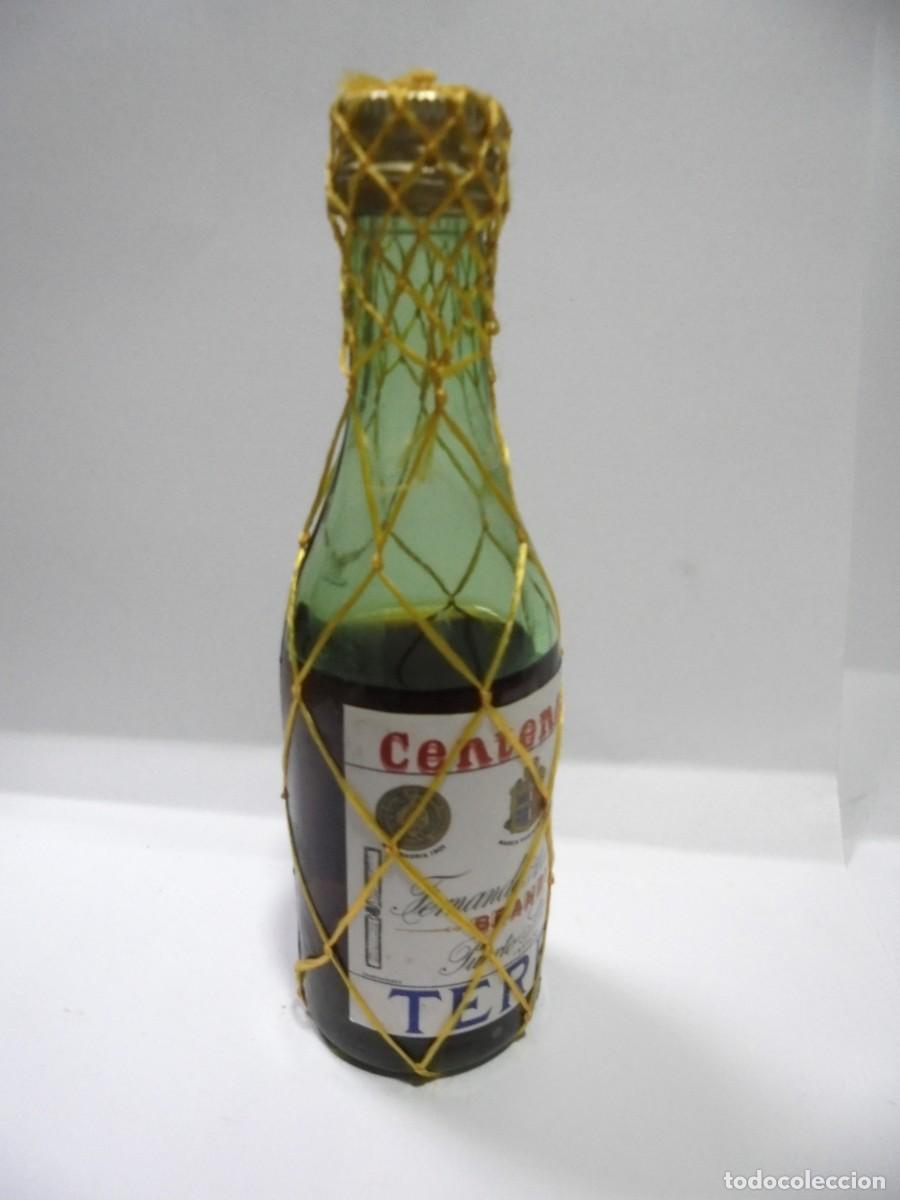 Coleccionismo de vinos y licores: BOTELLIN DE BRANDY TERRY. PEDRO A. DE TERRY. PUERTO DE SANTA MARIA. CERRADA. VER FOTOS.