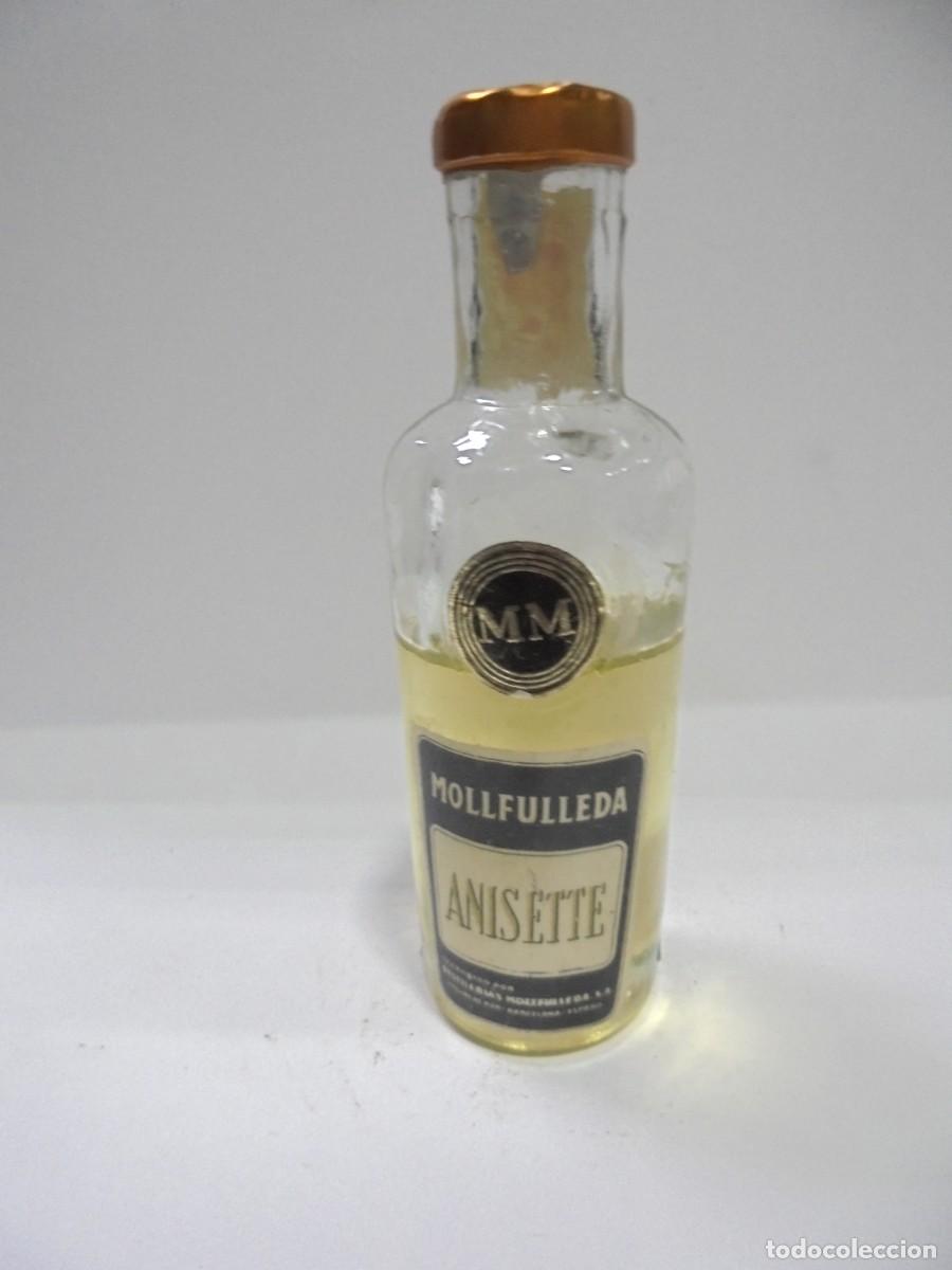 Sammlung von Weinen und Lik&ouml;ren: BOTELLIN DE ANISETTE. MOLLFULLEDA. CERRADA. VER FOTOS.