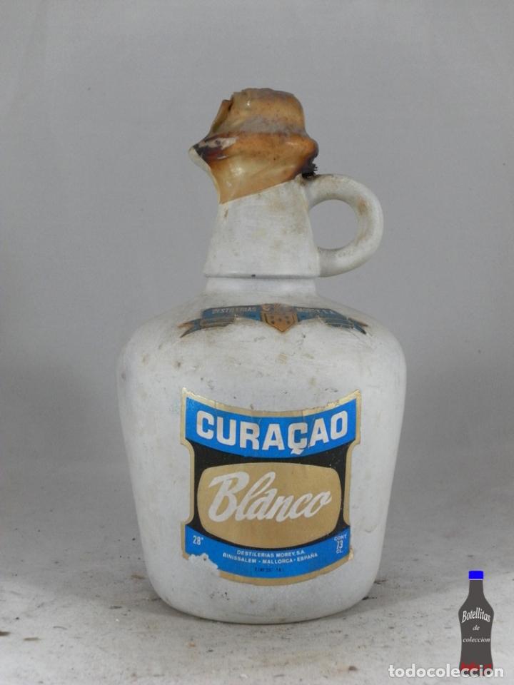 Collection of wines and liquors: BOTELLA GARRAFA CURACAO BLANCO DESTILERIAS MOREY BINISALEM MALLORCA