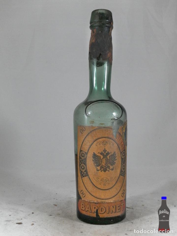 Sammlung von Weinen und Lik&ouml;ren: BOTELLA KUMMEL 00 BARDINET BORDEAUX 40 CENTIMOS 1957