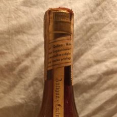 Coleccionismo de vinos y licores: GRAN LICOR QUINA-MOMO. Lote 401005409