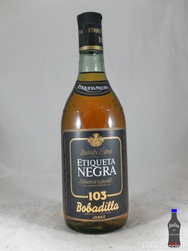 Coleccionismo de vinos y licores: BOTELLA BRANDY ETIQUETA NEGRA 103 BOBADILLA JEREZ