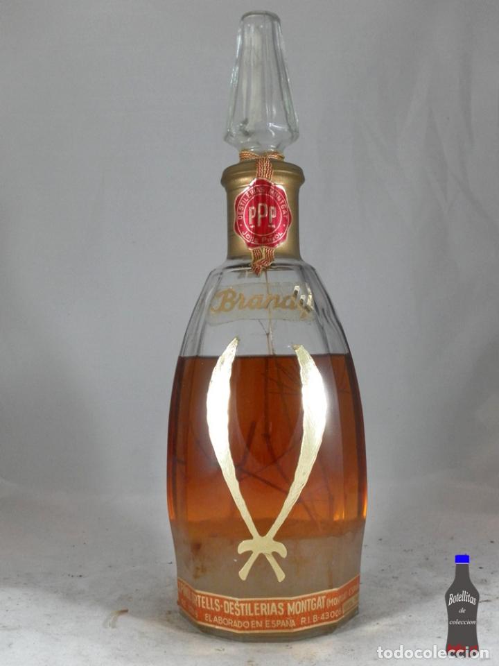 Coleccionismo de vinos y licores: BOTELLA BRANDY ESCARCHADO DESTILERIAS MONTGAT JOSE PI&Ntilde;OL ORTELLS