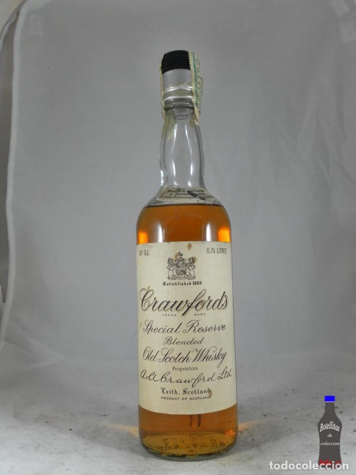 Collection of wines and liquors: BOTELLA CRAWFORDS SPECIAL RESERVE BLENDED OLD SCOTCH WHISKY LEITH SCOTLAND
