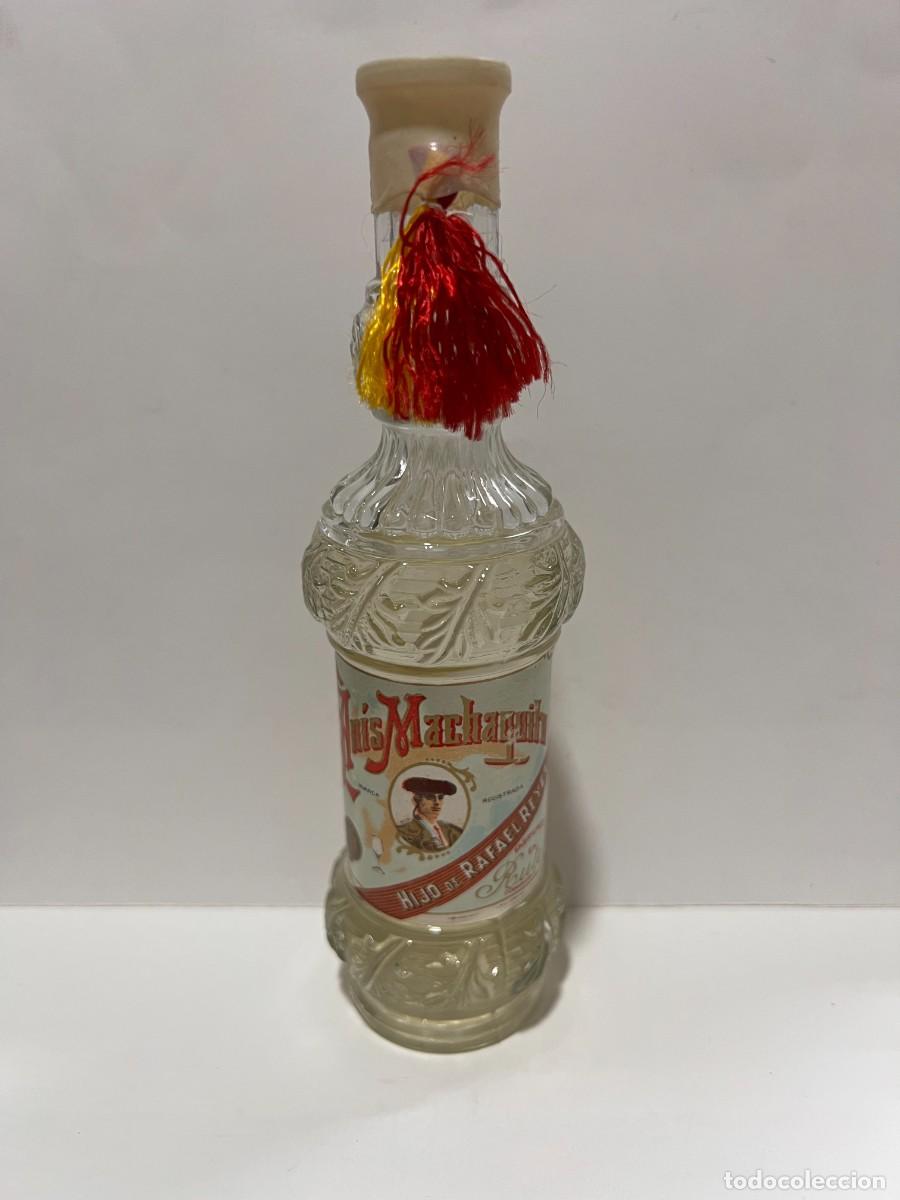 Sammlung von Weinen und Lik&ouml;ren: BOTELL&Iacute;N. AN&Iacute;S MACHAQUITO. ANISADO DULCE. HIJO DE RAFAEL REYES. FABRICANTE DE ROUTE. C&Oacute;RDOBA.LLENA