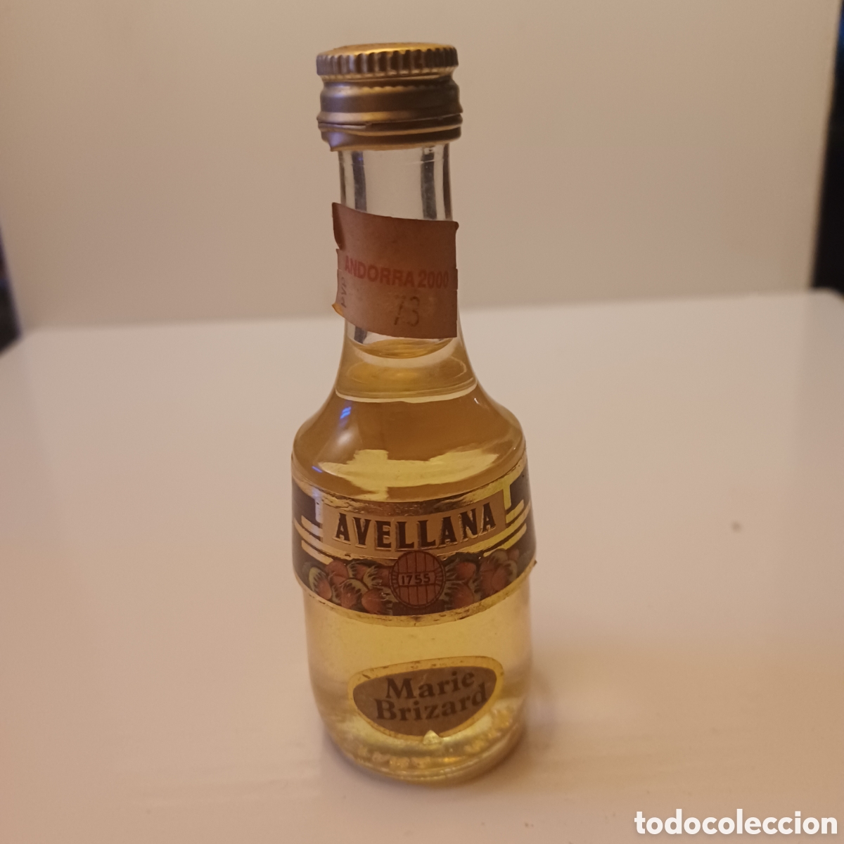 Coleccionismo de vinos y licores: Miniatura botellin cristal mini botella licor de avellana Marie Brizard 11 cm altura