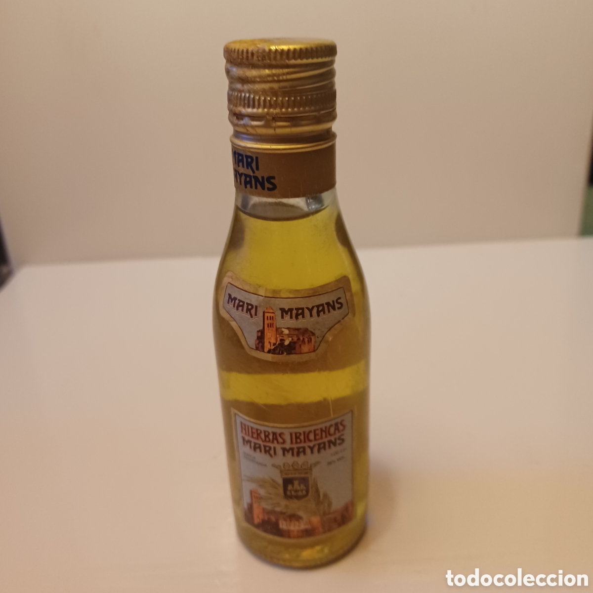 Coleccionismo de vinos y licores: Miniatura botellin cristal mini botella licor de hierbas ibicencas Mari Mayans 14,5 cm altura