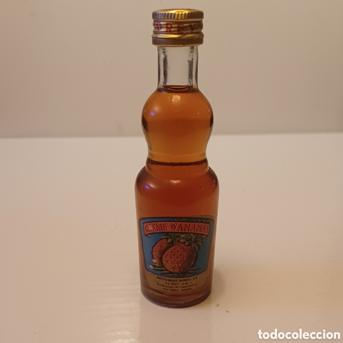 Coleccionismo de vinos y licores: Miniatura botellin cristal mini botella licor creme de Ananas Destiler&iacute;as Morey 12 cm altura