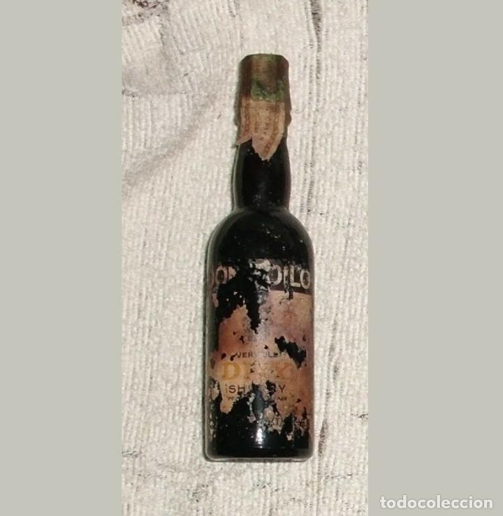 Coleccionismo de vinos y licores: BOTELLIN DE VINO DON ZOILO. ETIQUETA EN MAL ESTADO. RF-6458