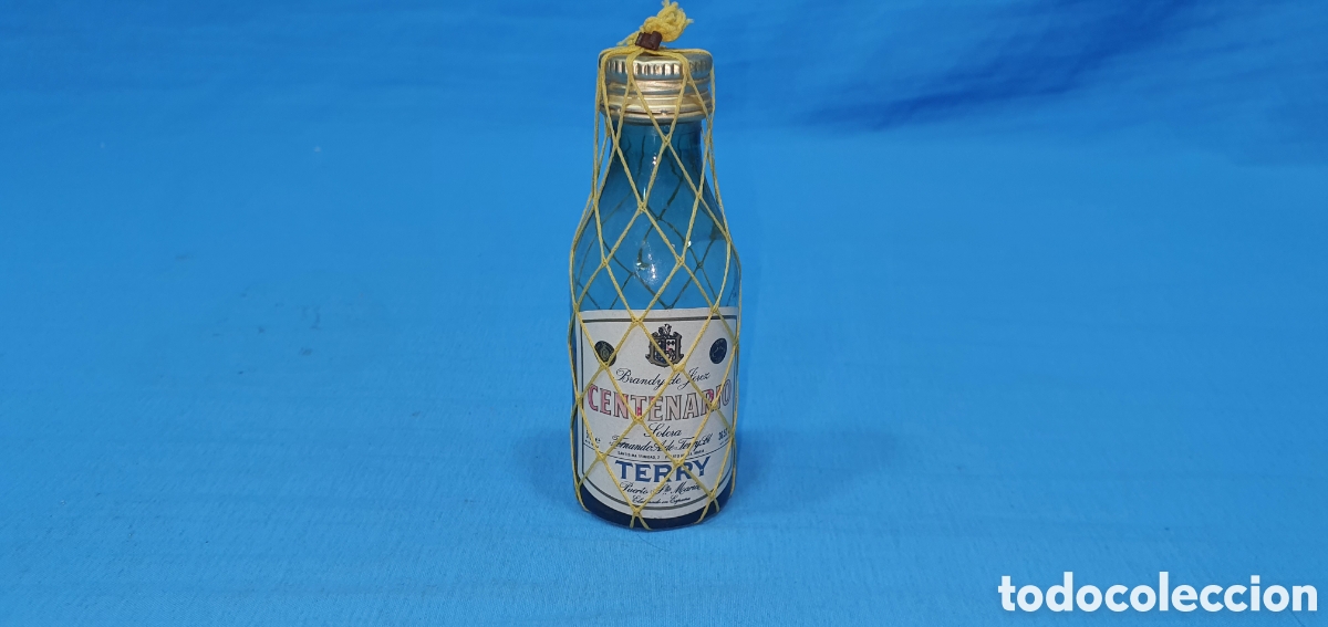 Coleccionismo de vinos y licores: BOTELLIN BRANDY CENTENARIO TERRY. SIN ABRIR, LIQUIDO EVAPORADO