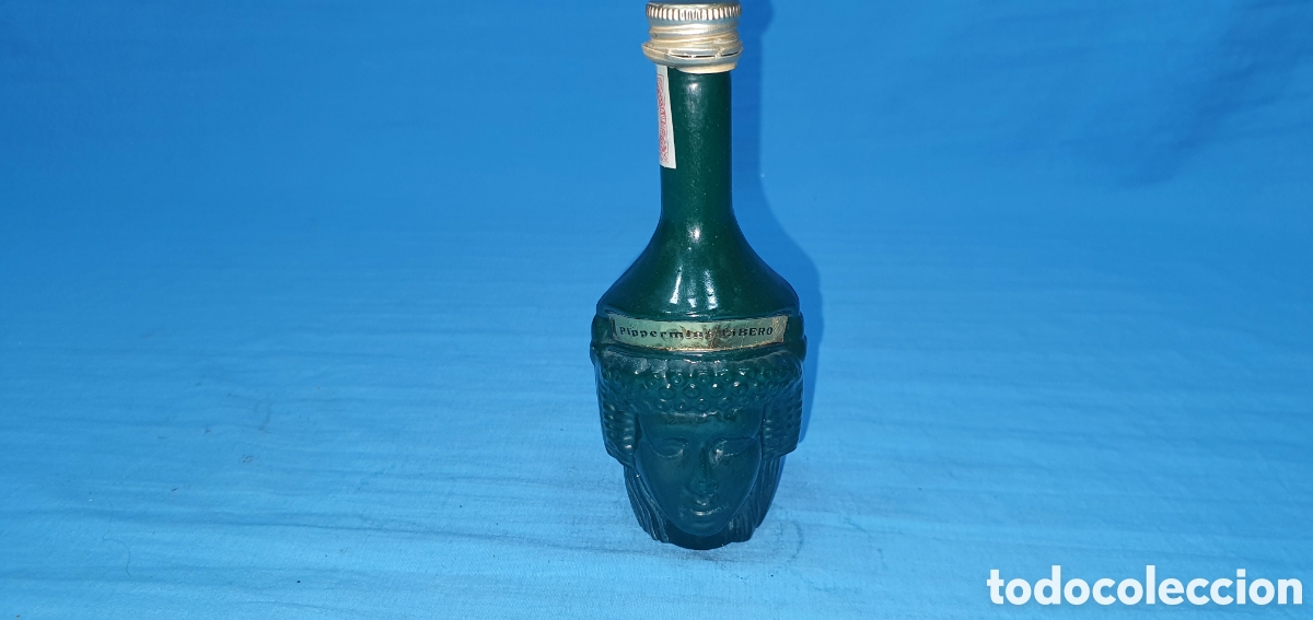 Coleccionismo de vinos y licores: BOTELLIN ROSTRO VERDE HOMBRE Y MUJER. LICOR PIPPERMINT LIBERO. SIN ABRIR