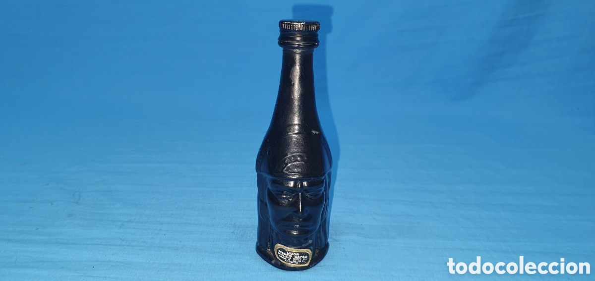 Coleccionismo de vinos y licores: BOTELLIN ROSTRO INDIO. LICOR MANCO CAPAC. MOREY. SIN ABRIR