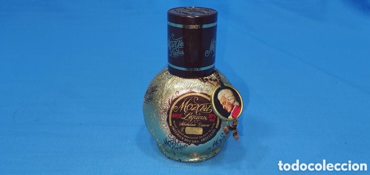Coleccionismo de vinos y licores: BOTELLIN MOZART LIQUEUR LICOR, EN PAPEL DORADO. SIN ABRIR