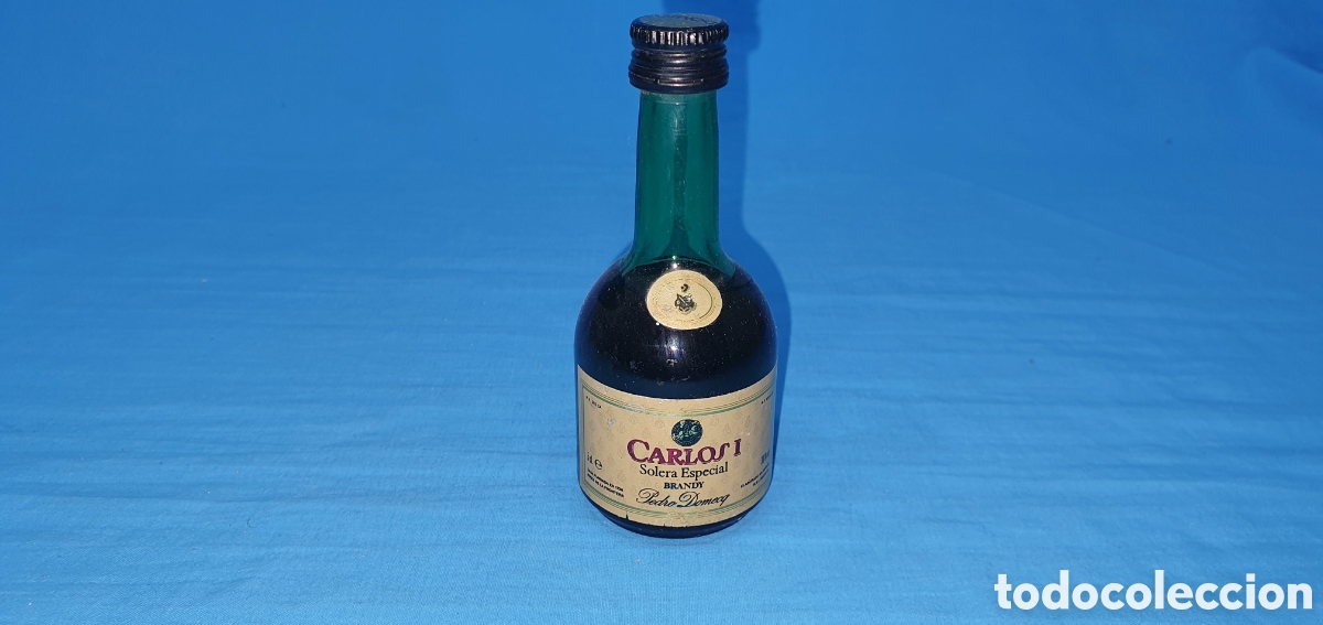 Coleccionismo de vinos y licores: BOTELLIN CARLOS I BRANDY. PEDRO DOMECQ. SIN ABRIR