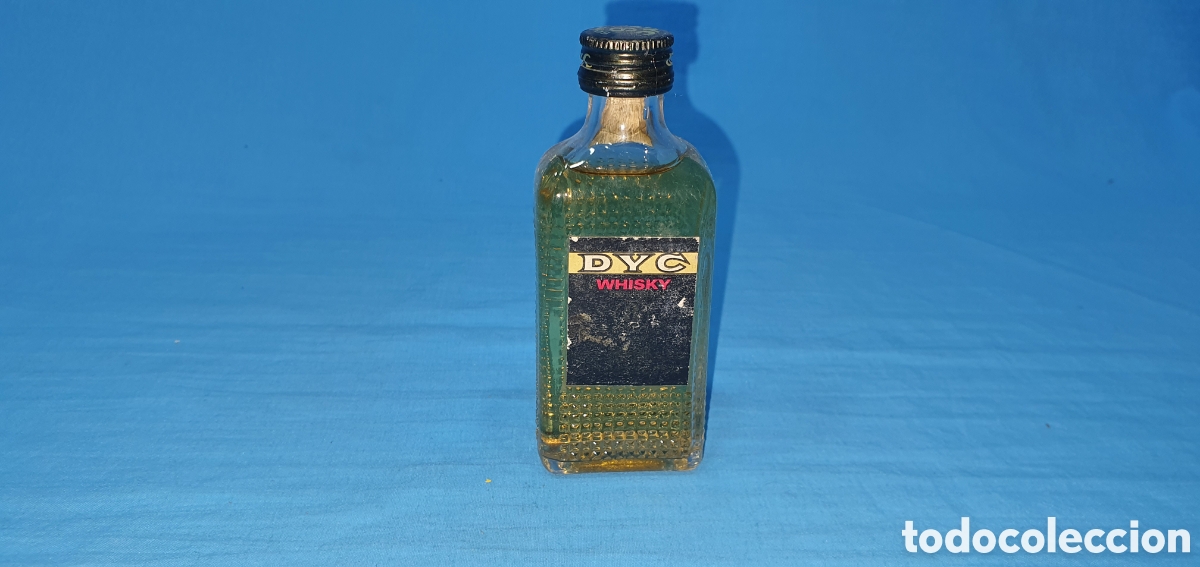 Coleccionismo de vinos y licores: BOTELLIN WHISKY DYC 8 A&Ntilde;OS. SIN ABRIR