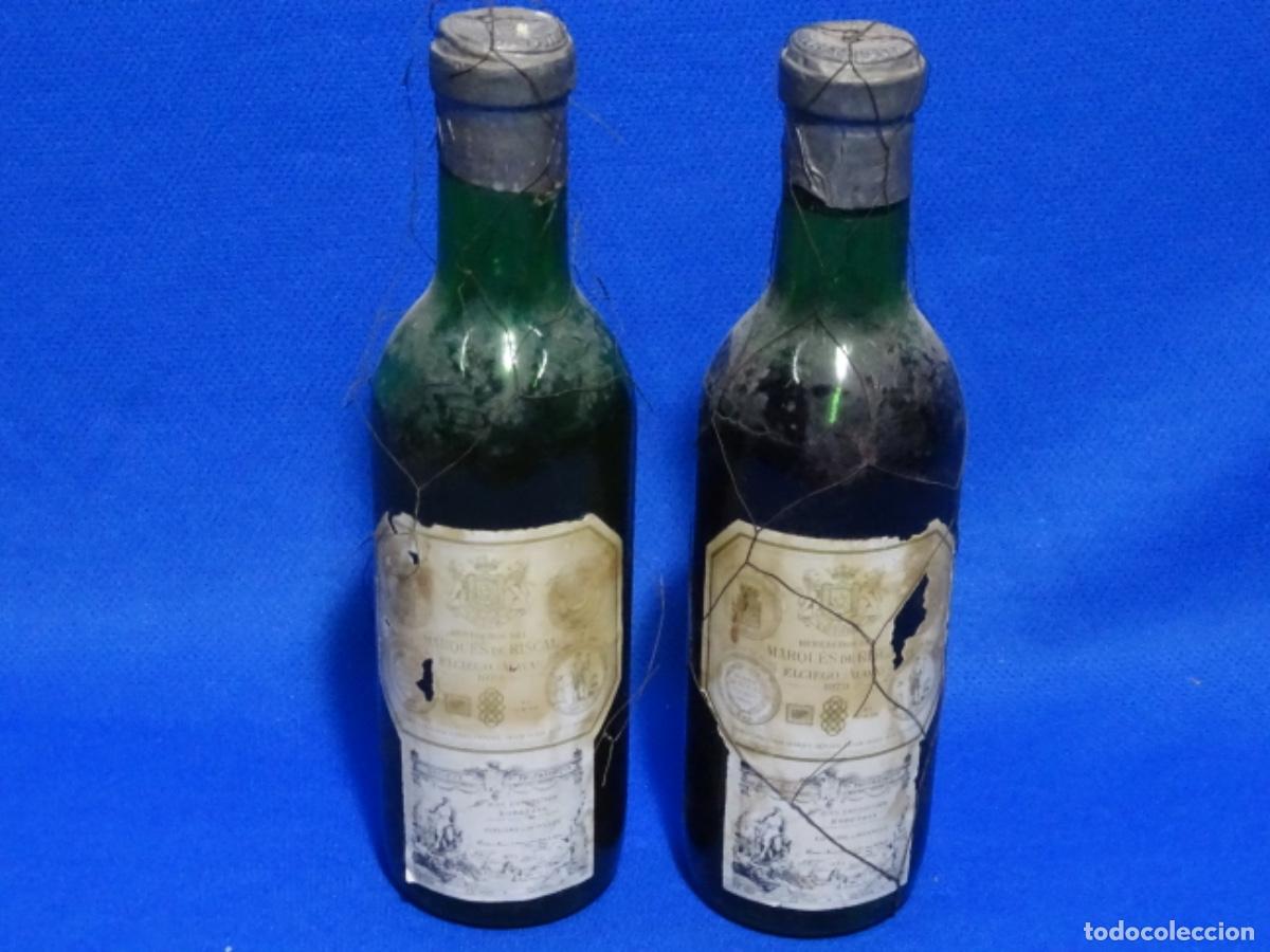 Collezionismo di vini e liquori: DOS BOTELLAS VINO MARQUES DE RISCAL COLECCI&Oacute;N 1973. 3/8 19x5x5 CM.