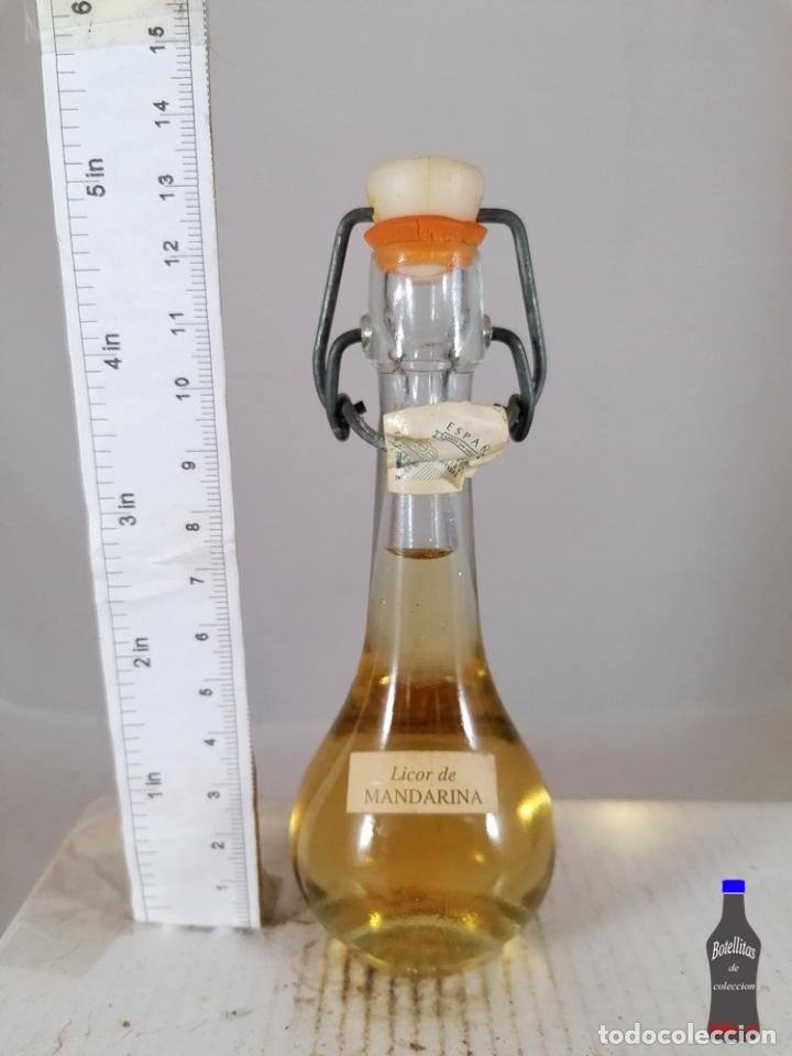 Coleccionismo de vinos y licores: BOTELLITA BOTELLIN LICOR DE MANDARINA