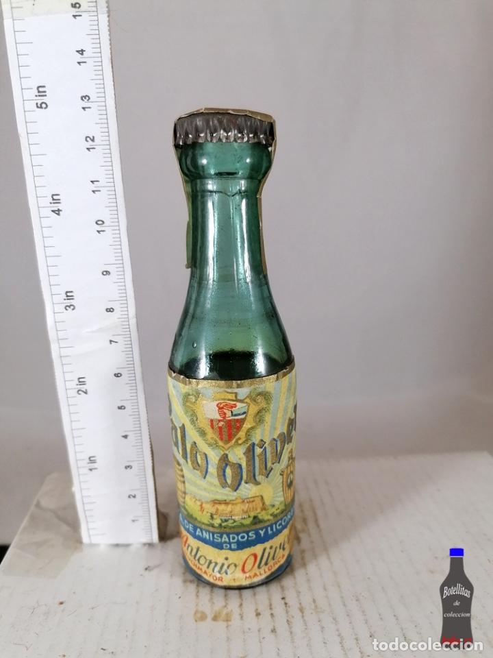 Sammlung von Weinen und Lik&ouml;ren: BOTELLITA BOTELLIN PALO OLIVER ANTONIO OLIVER LLUCHMAYOR MALLORCA CHAPA CORONA