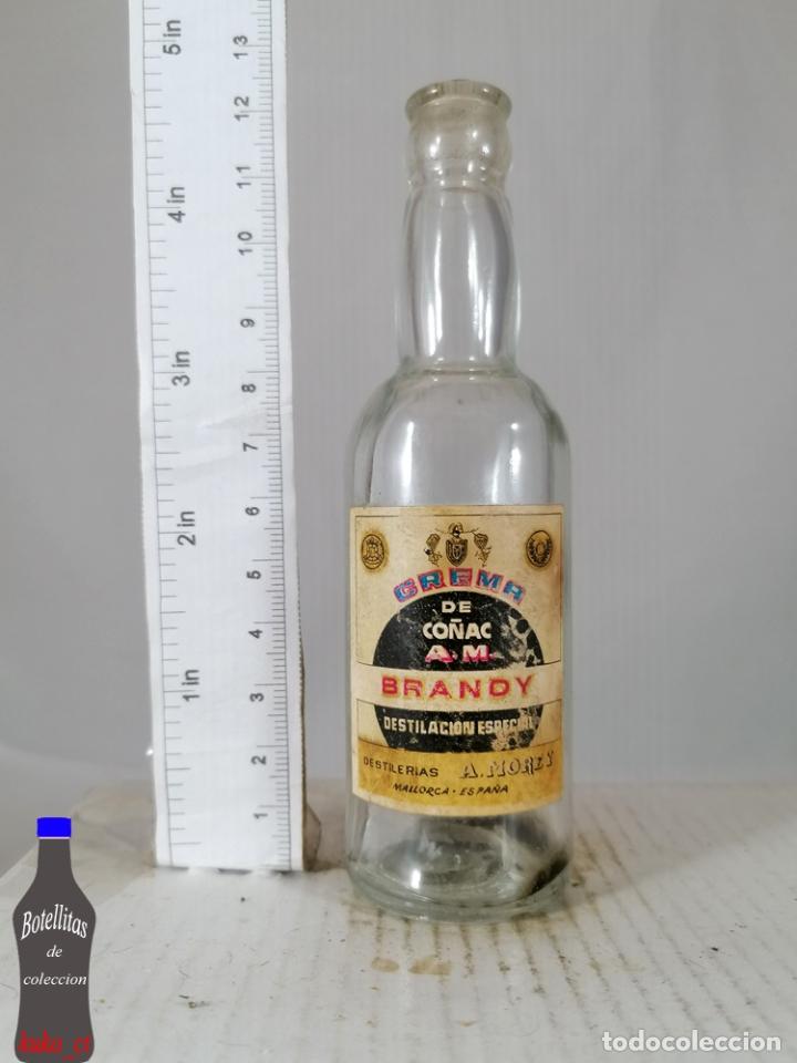 Coleccionismo de vinos y licores: BOTELLITA BOTELLIN CREMA DE CO&Ntilde;AC A.M. BRANDY DESTILERIAS MOREY MALLORCA