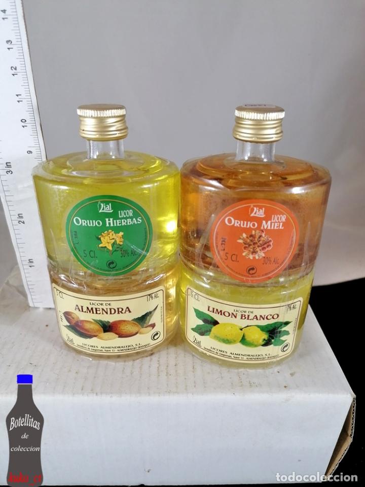 Coleccionismo de vinos y licores: BOTELLITA BOTELLIN LOTE 4 BOTELLINES APILABLES LIAL LICORES ORUJOS ALMENDRALEJO