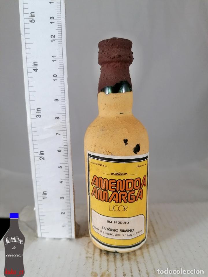 Coleccionismo de vinos y licores: BOTELLITA BOTELLIN LICOR AMENDOA AMARGA ANTONIO FIRMINO PORTUGAL