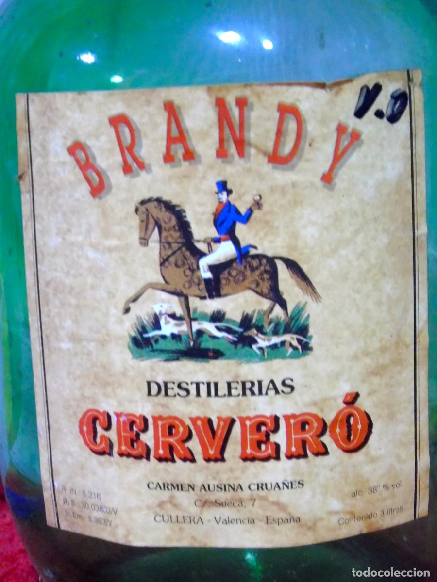 Coleccionismo de vinos y licores: GARRAFA VIDRIO VERDE CON ASA, BRANDY CERVERO