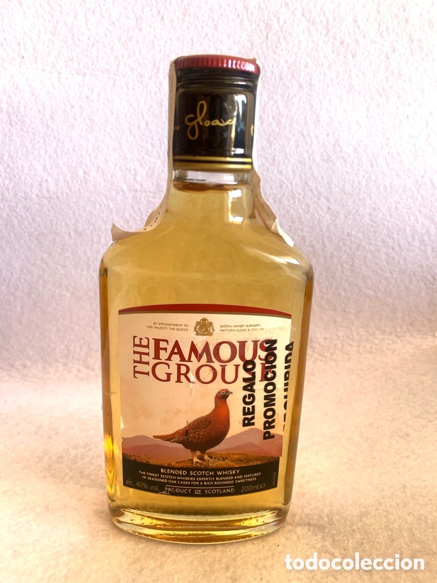 Coleccionismo de vinos y licores: Botella de whisky The famous Grouse 200 ml