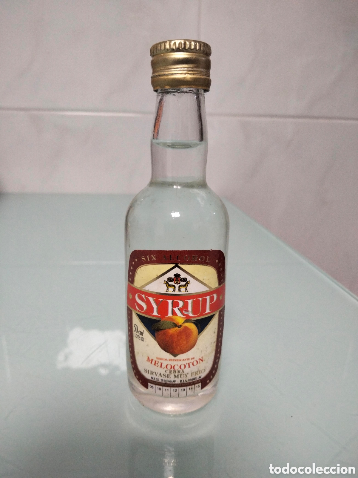 Coleccionismo de vinos y licores: Syrup licor de melocot&oacute;n botell&iacute;n miniatura coleccion