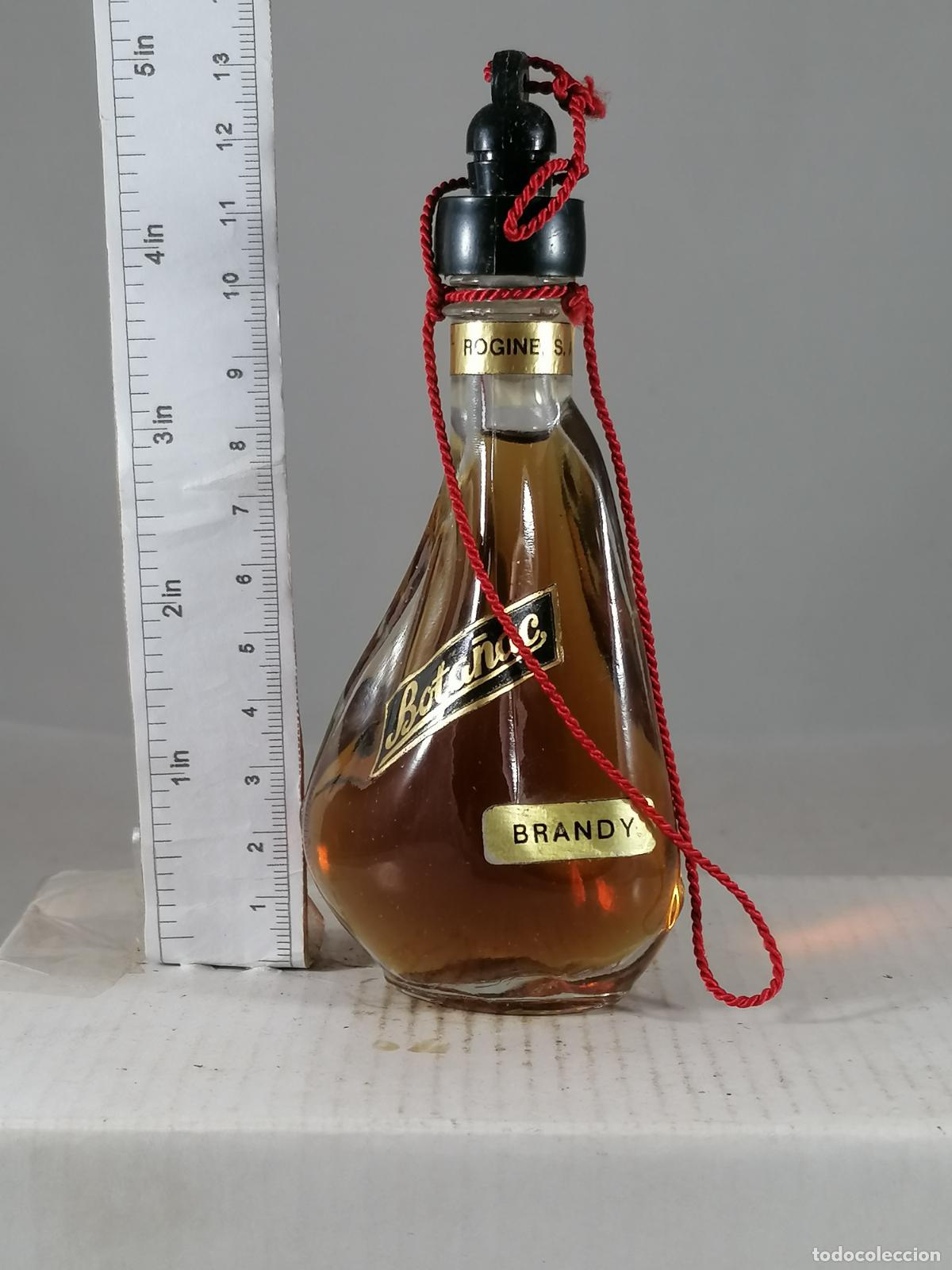 Coleccionismo de vinos y licores: BOTELLITA BOTELLIN BRANDY BOTA&Ntilde;AC DESTILERIAS ROGINE
