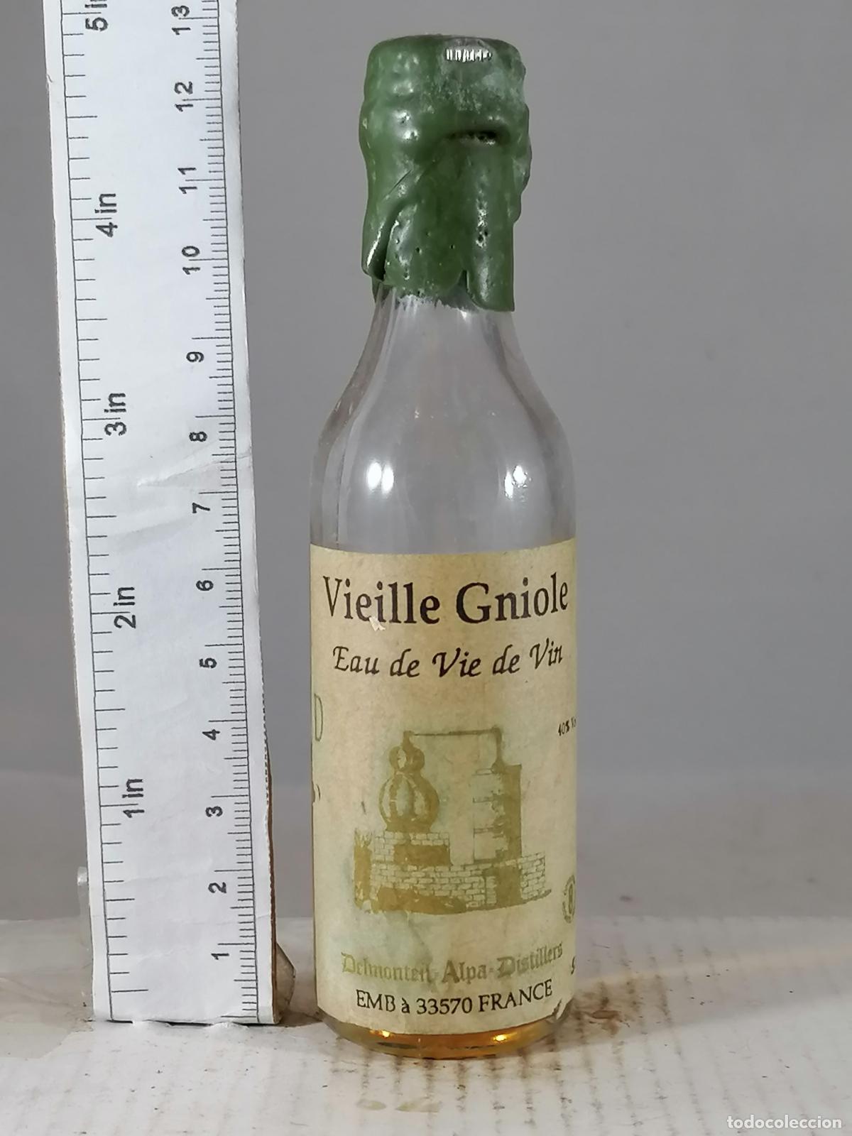 Sammlung von Weinen und Lik&ouml;ren: BOTELLITA BOTELLIN VIEILLE GNIOLE EAU VIE DE VIN DELMONTEIL ALPA FRANCE