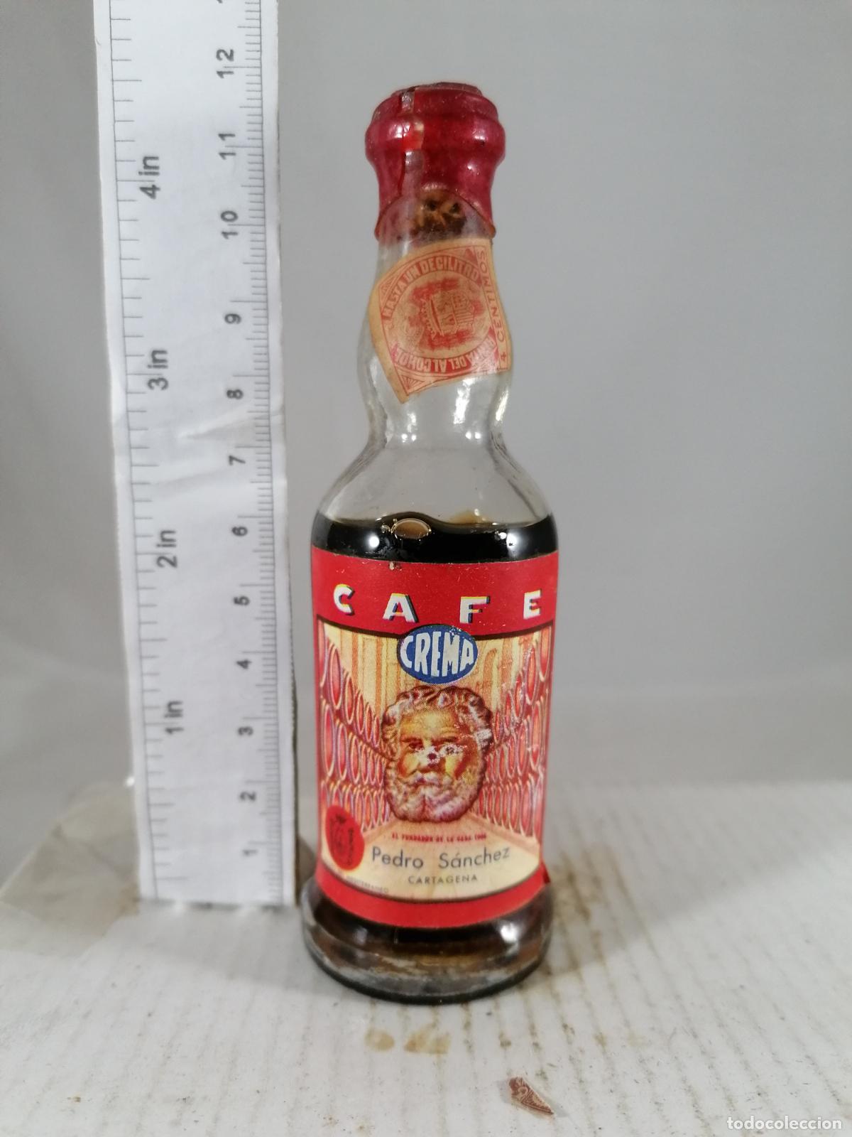 Coleccionismo de vinos y licores: BOTELLITA BOTELLIN CREMA DE CAFE PEDRO SANCHEZ LICOR 49 CARTAGENA