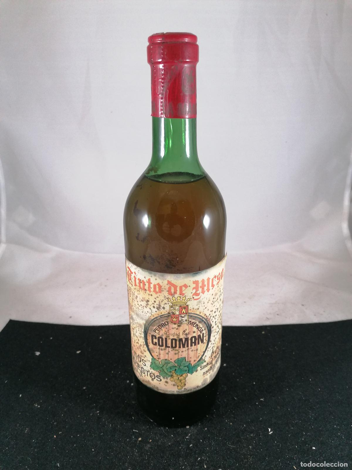 Sammlung von Weinen und Lik&ouml;ren: BOTELLA VINO TINTO DE MESA COLOMAN GRUPO SINDICAL MANCHEGO PEDRO MU&Ntilde;OZ CIUDAD REAL