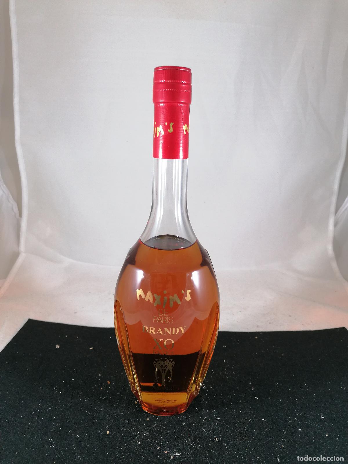Coleccionismo de vinos y licores: BOTELLA BRANDY MAXIM&acute;S DE PARIS XO EXTRA MAXIM&acute;S CELLAR 70 CL 40% RARA