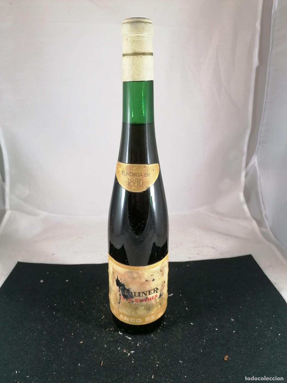 Collection of wines and liquors: BOTELLA VINO KRALINER BLANCO SECO RENE BARBIER