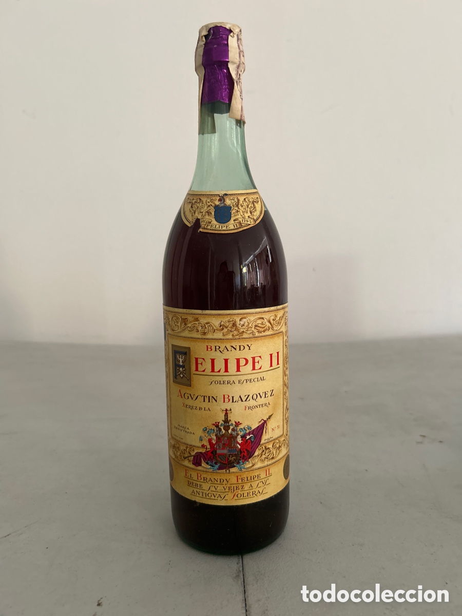 Coleccionismo de vinos y licores: BOTELLA DE CO&Ntilde;AC, BRANDY FELIPE II PRECINTO DE 4 PTAS, SIN ABRIR, LLENA Y CON SU PRECINTO