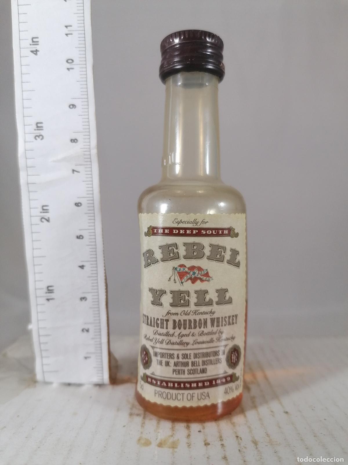Collection of wines and liquors: BOTELLITA BOTELLIN WHISKEY BOURBON REBEL YELL KENTUCKY ARTHUR BELL SCOTLAND