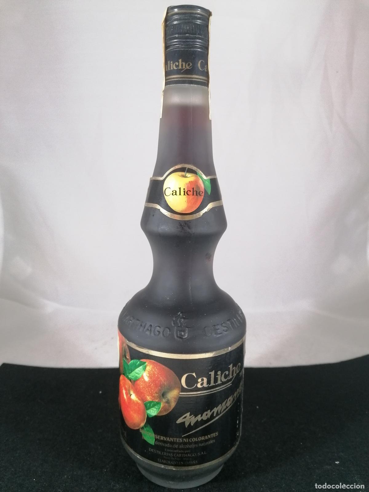 Collection of wines and liquors: BOTELLA CALICHE MANZANA DESTILERIAS CARTHAGO TORRE PACHECO MURCIA