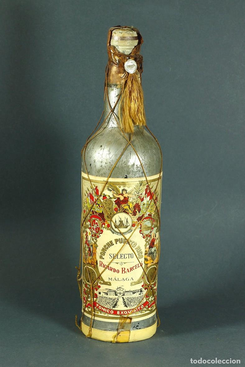 Coleccionismo de vinos y licores: ANTIGUA BOTELLA DE PONCHE PUERTO RICO. RICARDO BARCEL&Oacute;. M&Aacute;LAGA. PRECINTO 80 C&Eacute;NTIMOS. 31 CMS. ALTURA