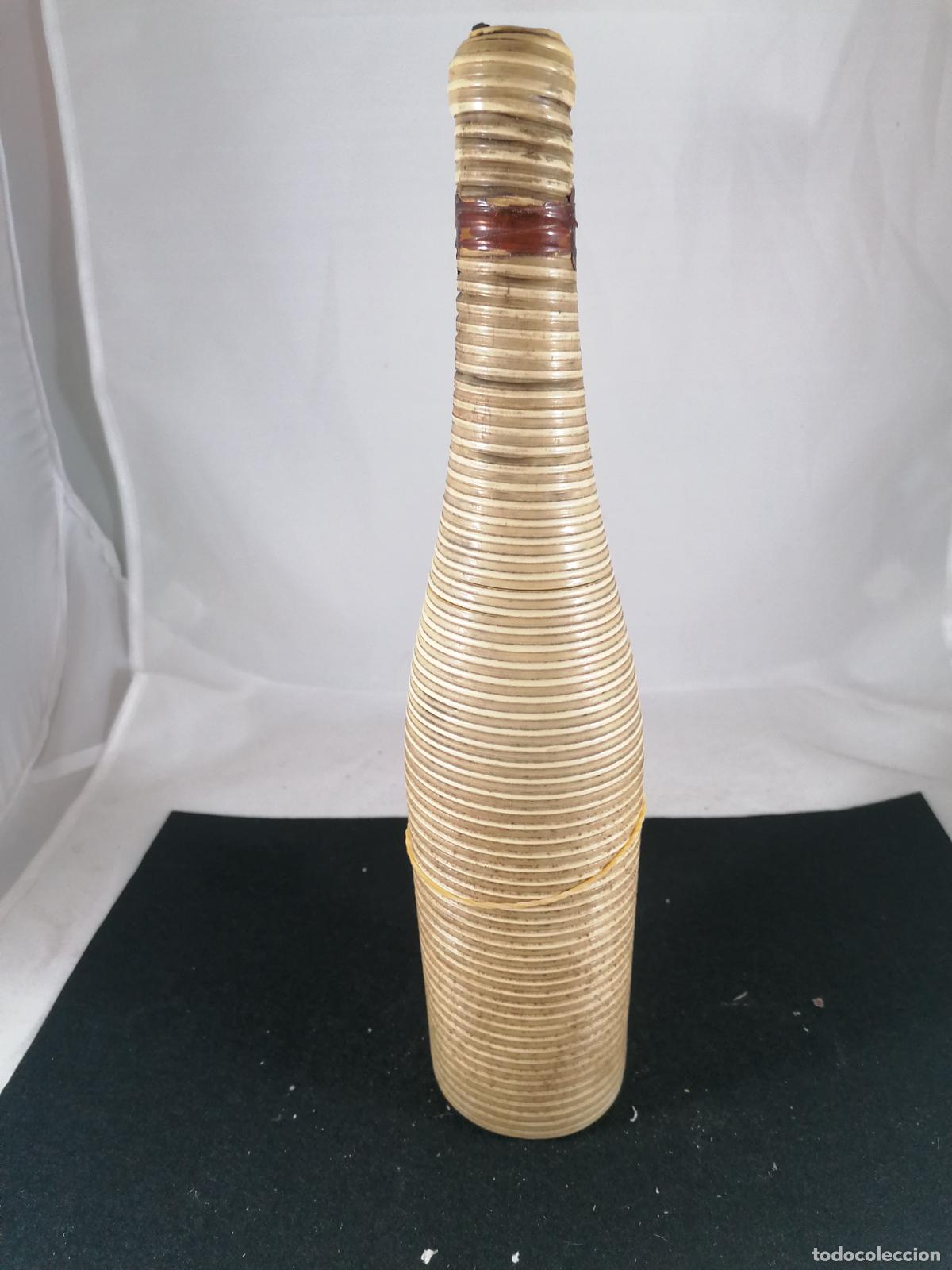 Collection of wines and liquors: BOTELLA UN CREMAT CREMA CATALANA ALTAMS ESPA&Ntilde;A FORRADA TECNICA SCOBIDOO