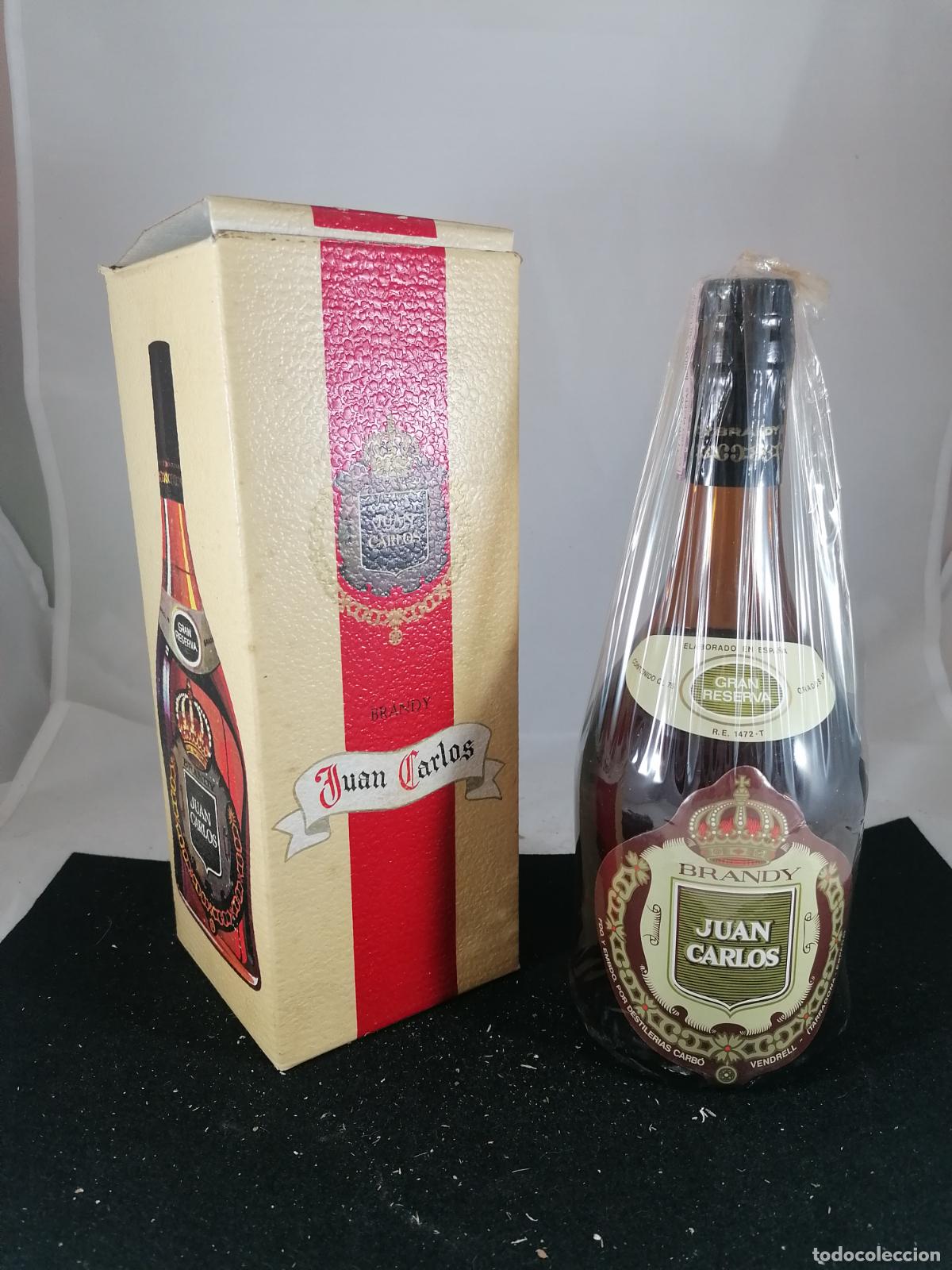 Coleccionismo de vinos y licores: BOTELLA + CAJA BRANDY JUAN CARLOS GRAN RESERVA DESTILERIAS CARBO EL VENDRELL TARRAGONA 4 PESETAS