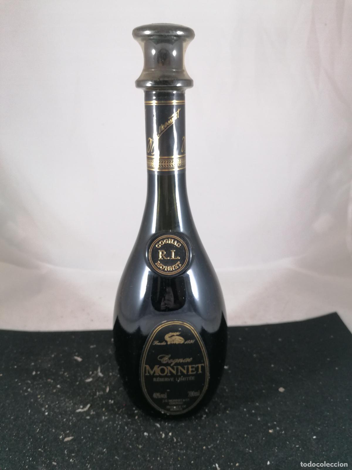 Collection of wines and liquors: BOTELLA COGNAC MONNET RESERVE LIMITEE LT JG MONNET & CO FRANCE