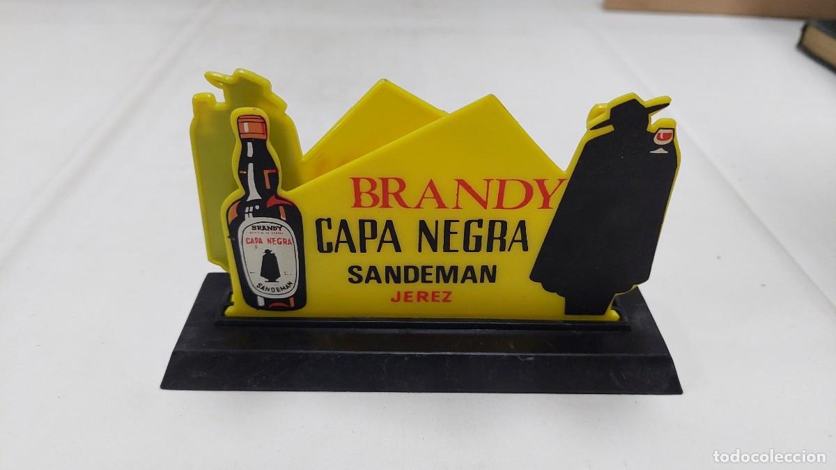 Coleccionismo de vinos y licores: Antiguo servilletero Brandy Capa negra Sandeman Jerez