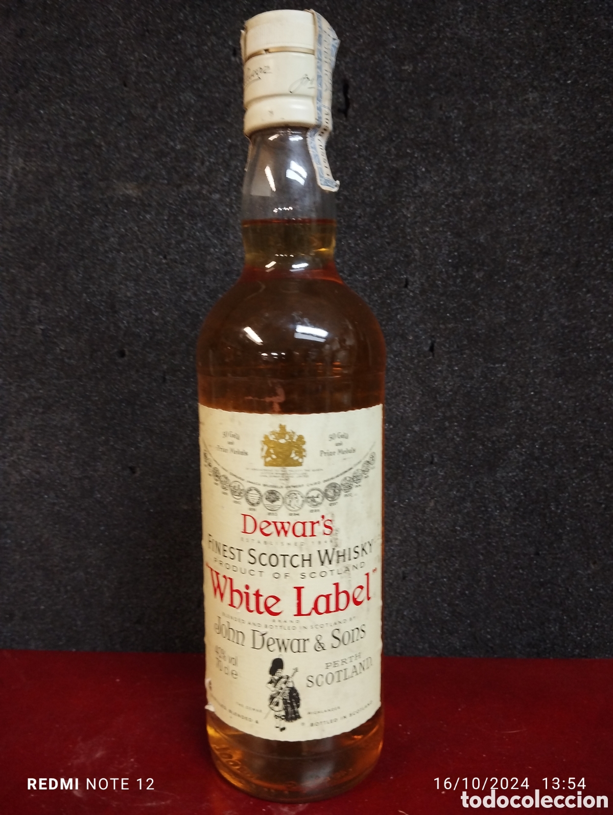 Coleccionismo de vinos y licores: Botella sin abrir whisky White Label