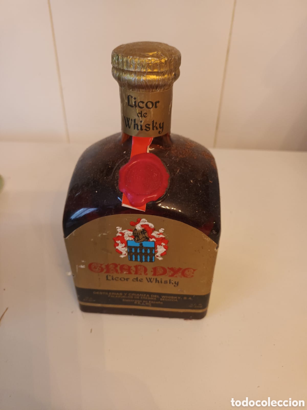 Coleccionismo de vinos y licores: ANTIGUA BOTELLA LICOR DE WHISKY GRAN DYC A&Ntilde;OS 60