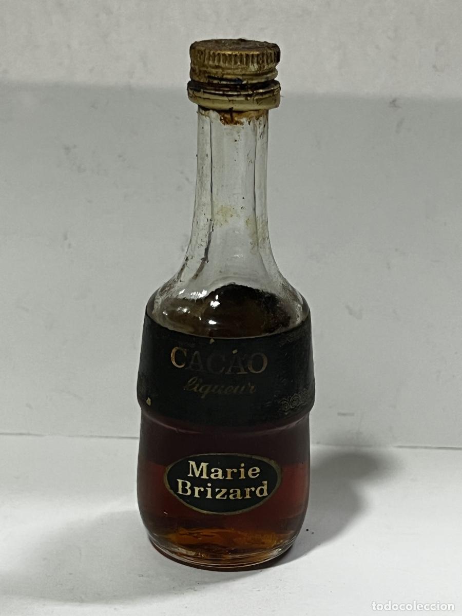 Collection of wines and liquors: BOTELL&Iacute;N. LIQUEUR CACAO. MARIE BRIZARD.