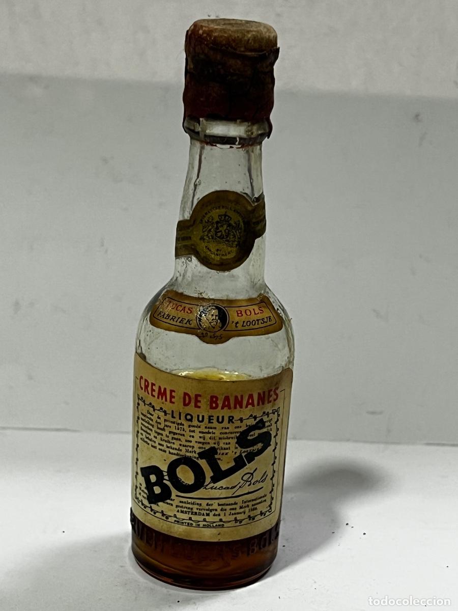 Collection of wines and liquors: BOTELL&Iacute;N. CREMA DE BANANES. ERVEN LUCAS BOLS. LIQUEUR. AMSTERDAM.