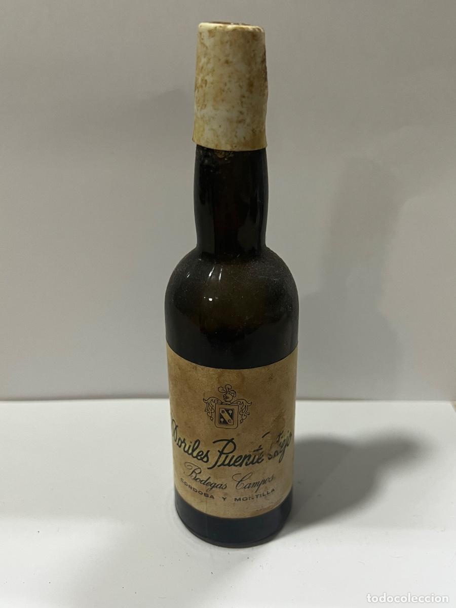 Coleccionismo de vinos y licores: BOTELL&Iacute;N. MORILES PUENTE A&Ntilde;EJO. BODEGAS CAMPOS. C&Oacute;RDOBA Y MONTILLA.